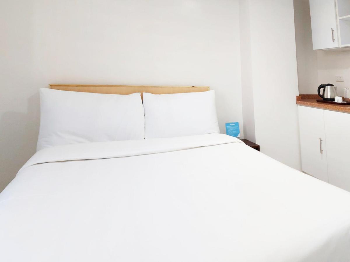 Airobedz Mckinley - Near Sm Aura Hotel มะนิลา ภายนอก รูปภาพ