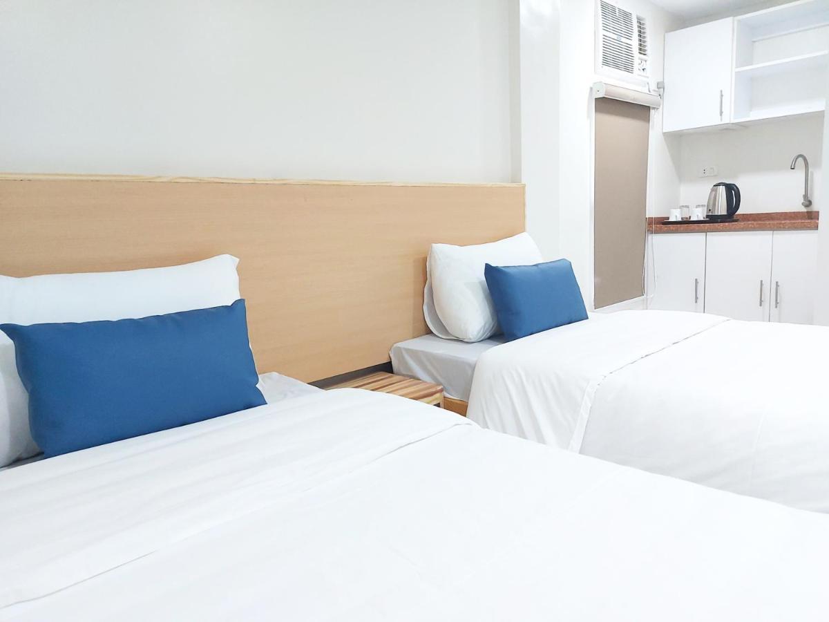 Airobedz Mckinley - Near Sm Aura Hotel มะนิลา ภายนอก รูปภาพ